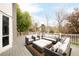 Relaxing deck with comfortable outdoor seating arrangement, perfect for entertaining or lounging at 5962 S Sheridan Way, Littleton, CO 80123