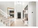 Bright foyer with soaring ceilings, a modern staircase, and stylish decor, creating a grand entrance at 5962 S Sheridan Way, Littleton, CO 80123