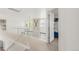 Upstairs hallway with white railings overlooking the floor below at 5962 S Sheridan Way, Littleton, CO 80123