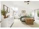 Spacious main bedroom with vaulted ceilings and a large bed at 5962 S Sheridan Way, Littleton, CO 80123