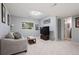Basement with carpet, and a sofa at 1355 S Ulster St, Denver, CO 80231
