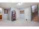 Finished basement with carpet and access to the upper level at 1355 S Ulster St, Denver, CO 80231