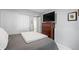 Carpeted bedroom with a closet and chest of drawers at 1355 S Ulster St, Denver, CO 80231