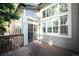 Back deck area featuring large windows allowing ample natural light into the home at 1355 S Ulster St, Denver, CO 80231