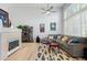 Living room with vaulted ceilings and bright natural light, creating a spacious and inviting atmosphere at 1355 S Ulster St, Denver, CO 80231