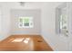 Bright bedroom with hardwood floors, bay window, and neutral wall color at 539 Baker St, Longmont, CO 80501