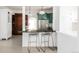 Bright, open kitchen featuring a breakfast bar and modern appliances at 539 Baker St, Longmont, CO 80501