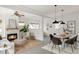 Cozy living room with fireplace and comfortable seating area, complemented by natural light and stylish decor at 539 Baker St, Longmont, CO 80501