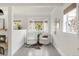 Bright sitting area with bay window and comfortable armchairs at 539 Baker St, Longmont, CO 80501