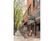 Charming street view of shops, including Angles Ski and Snowboard and Rosalee's Pizzeria at 539 Baker St, Longmont, CO 80501