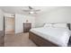 Neutral bedroom offers great natural light and en suite bath at 1107 Sunrise Dr, Brighton, CO 80603