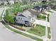 Aerial view showcasing a home with a fenced backyard, manicured lawn, and a long driveway at 404 Dusk Ct, Erie, CO 80516
