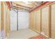 Unfinished basement with exposed framing and concrete flooring, ready for customization at 404 Dusk Ct, Erie, CO 80516
