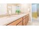 Spacious bathroom featuring a double sink granite vanity, a separate door to the toilet and a shower at 404 Dusk Ct, Erie, CO 80516