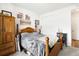 This is a bedroom with neutral carpet and an adjacent closet space at 17247 E 103Rd Ave, Commerce City, CO 80022