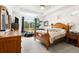 Inviting bedroom filled with natural light and scenic neighborhood views at 17247 E 103Rd Ave, Commerce City, CO 80022