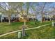 Well-manicured green space featuring mature trees and a walking path in the community at 1612 S Idalia Cir # A, Aurora, CO 80017