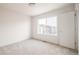 Simple bedroom with a window overlooking the neighborhood at 5653 W 10Th Ave, Lakewood, CO 80214