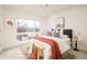 Spacious bedroom with large window and city view at 5653 W 10Th Ave, Lakewood, CO 80214