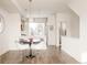 Modern dining area with black and white patterned chairs at 5653 W 10Th Ave, Lakewood, CO 80214