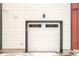 White garage door with windows, address number 5653 at 5653 W 10Th Ave, Lakewood, CO 80214