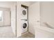 Stackable washer and dryer in a closet at 5653 W 10Th Ave, Lakewood, CO 80214