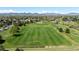 Wide aerial shot of a meticulously maintained soccer field in the neighborhood at 8705 W Berry Ave # 204, Littleton, CO 80123