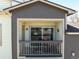 Upper-level balcony with a view, featuring comfortable seating and a cozy ambiance at 8705 W Berry Ave # 204, Littleton, CO 80123