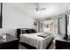 Bedroom with a large window and a ceiling fan at 8705 W Berry Ave # 204, Littleton, CO 80123
