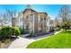 Two-story condo with a private entrance, lovely siding, and well-maintained landscaping at 8705 W Berry Ave # 204, Littleton, CO 80123