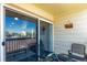 Small outdoor patio with room for two chairs and an outdoor table at 8705 W Berry Ave # 204, Littleton, CO 80123
