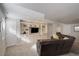 Finished basement with large entertainment center, TV and comfortable seating at 3207 Opal Ln, Superior, CO 80027