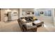 Basement with a large, comfortable seating area, a wet bar with stainless steel refrigerator and large windows at 3207 Opal Ln, Superior, CO 80027