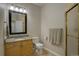 Clean bathroom with granite countertop vanity and glass enclosed shower at 3207 Opal Ln, Superior, CO 80027