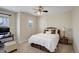 Neutral bedroom featuring a full-sized bed, window with natural light and carpeted floors at 3207 Opal Ln, Superior, CO 80027
