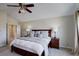 This bedroom has a ceiling fan and large windows that let in plenty of natural light at 3207 Opal Ln, Superior, CO 80027
