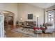 Cozy living room showcasing a neutral palette, hardwood floors, and ample natural light at 3207 Opal Ln, Superior, CO 80027