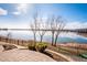 Breathtaking lake views from the backyard patio provide a serene and picturesque setting at 7700 W Grand Ave, Littleton, CO 80123