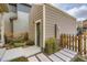 Exterior view of the home's back door, yard, and fence at 1137 Hummingbird Cir, Longmont, CO 80501