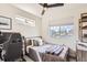 Bright bedroom with modern furnishings, neutral decor, and lots of natural light at 1137 Hummingbird Cir, Longmont, CO 80501