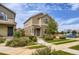 Charming two-story home featuring well-maintained landscaping, a welcoming entrance, and a neatly manicured lawn at 1137 Hummingbird Cir, Longmont, CO 80501