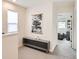Bright hallway with carpet and view of bedroom through open door at 1137 Hummingbird Cir, Longmont, CO 80501
