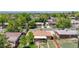 Aerial view of the house showcasing its proximity to neighborhood homes and mature trees at 8774 Princeton St, Westminster, CO 80031