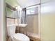 Bathroom featuring a shower with tile surround, and modern vanity with sink at 8774 Princeton St, Westminster, CO 80031