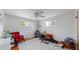 Bright bedroom with natural light showcases hardwood floors, dual windows, and unique decorations at 8774 Princeton St, Westminster, CO 80031