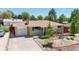 Inviting ranch home features a brick facade, attached garage, and landscaped front yard, creating great curb appeal at 8774 Princeton St, Westminster, CO 80031