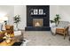 Modern gold and black fireplace in a finished basement at 287 Johnson Dr, Castle Rock, CO 80104