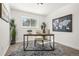 Bright home office features a desk, window, and world map at 287 Johnson Dr, Castle Rock, CO 80104