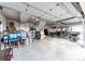 Spacious garage featuring high ceilings, ample storage, and parking for recreational vehicles at 4820 S County Road 137, Bennett, CO 80102