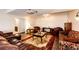 Comfortable living room features a projector, plush seating, and stylish decor at 4820 S County Road 137, Bennett, CO 80102